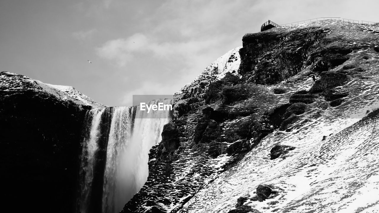 SCENIC VIEW OF WATERFALL