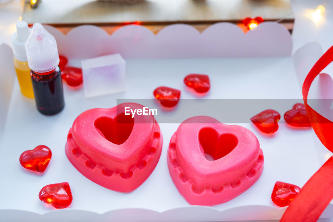 valentine's day, red, heart, heart shape, love, positive emotion, pink, emotion, petal, sweet, sweet food, food and drink, no people, candle, celebration, lip, food, candy, indoors, dessert, flower, event