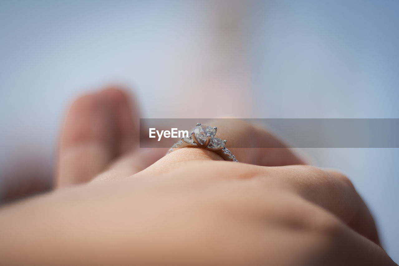 Close-up of woman hand with ring