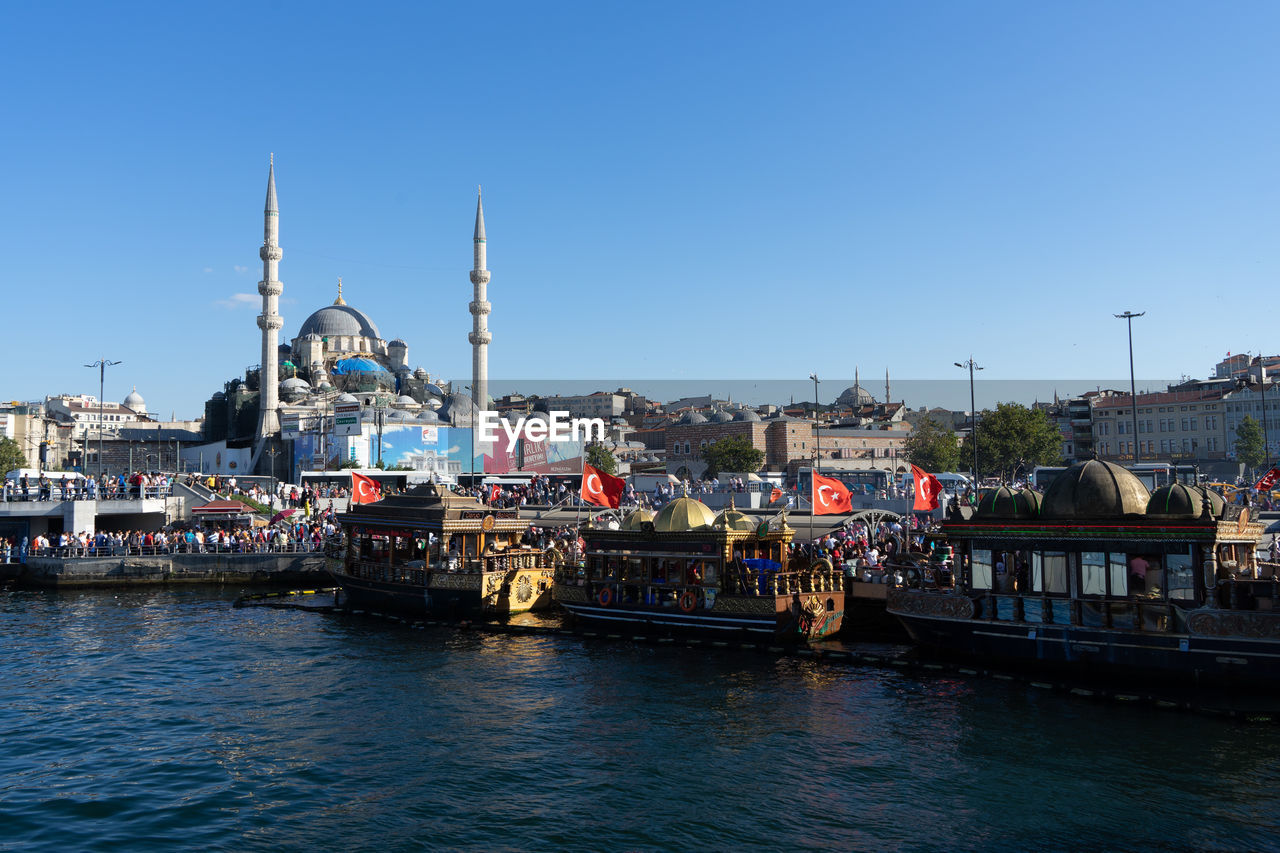 VIEW OF MOSQUE AT WATERFRONT
