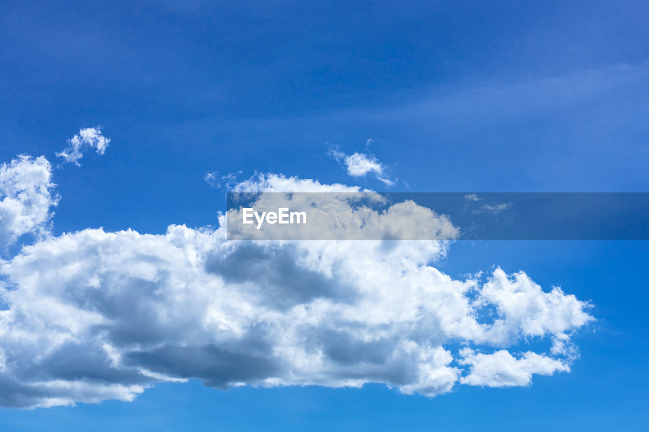 sky, cloud, daytime, blue, environment, nature, cloudscape, white, atmosphere, backgrounds, beauty in nature, idyllic, wind, fluffy, clear sky, no people, scenics - nature, outdoors, tranquility, azure, overcast, day, light - natural phenomenon, sunlight, religion, summer, high up, flying, spirituality, bright, climate, vibrant color, landscape, copy space, meteorology, mid-air, tranquil scene, storm cloud, softness