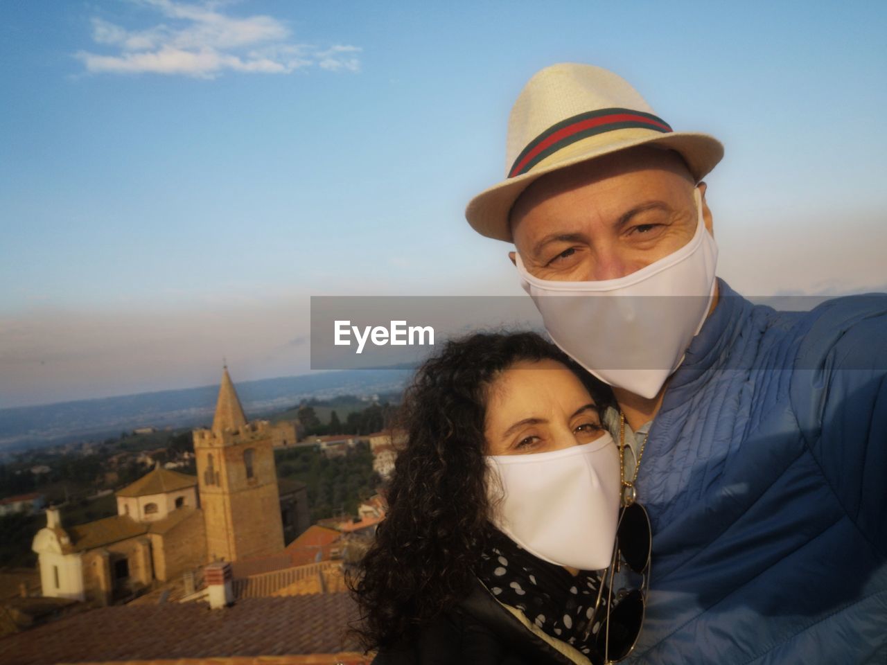 Selfie of couple with masks