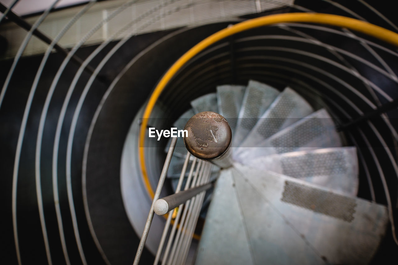 High angle view of empty spiral staircase