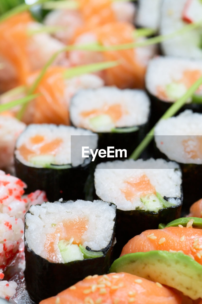 CLOSE-UP OF SUSHI SERVED IN TRAY