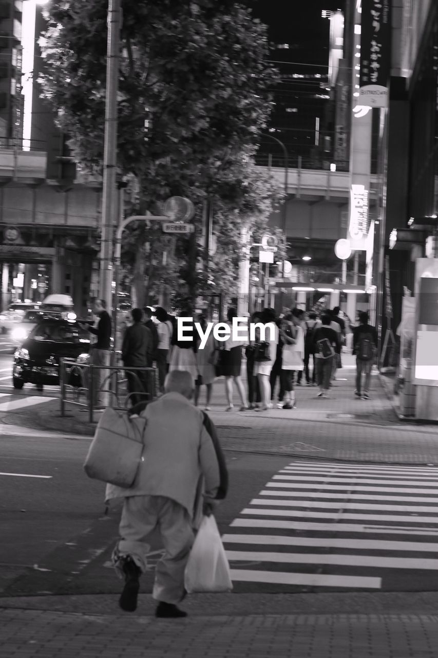 WOMAN WALKING ON STREET