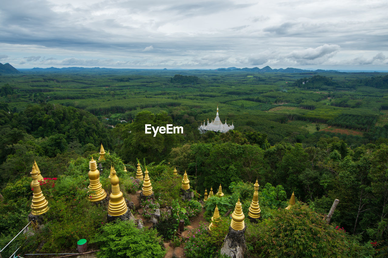 Panoramic view of temples and mountains against sky