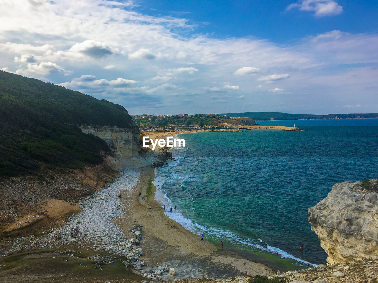 Scenic view of bay against sky