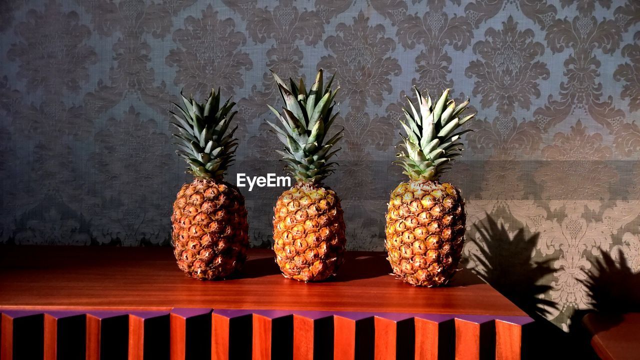 Pineapples on table in home