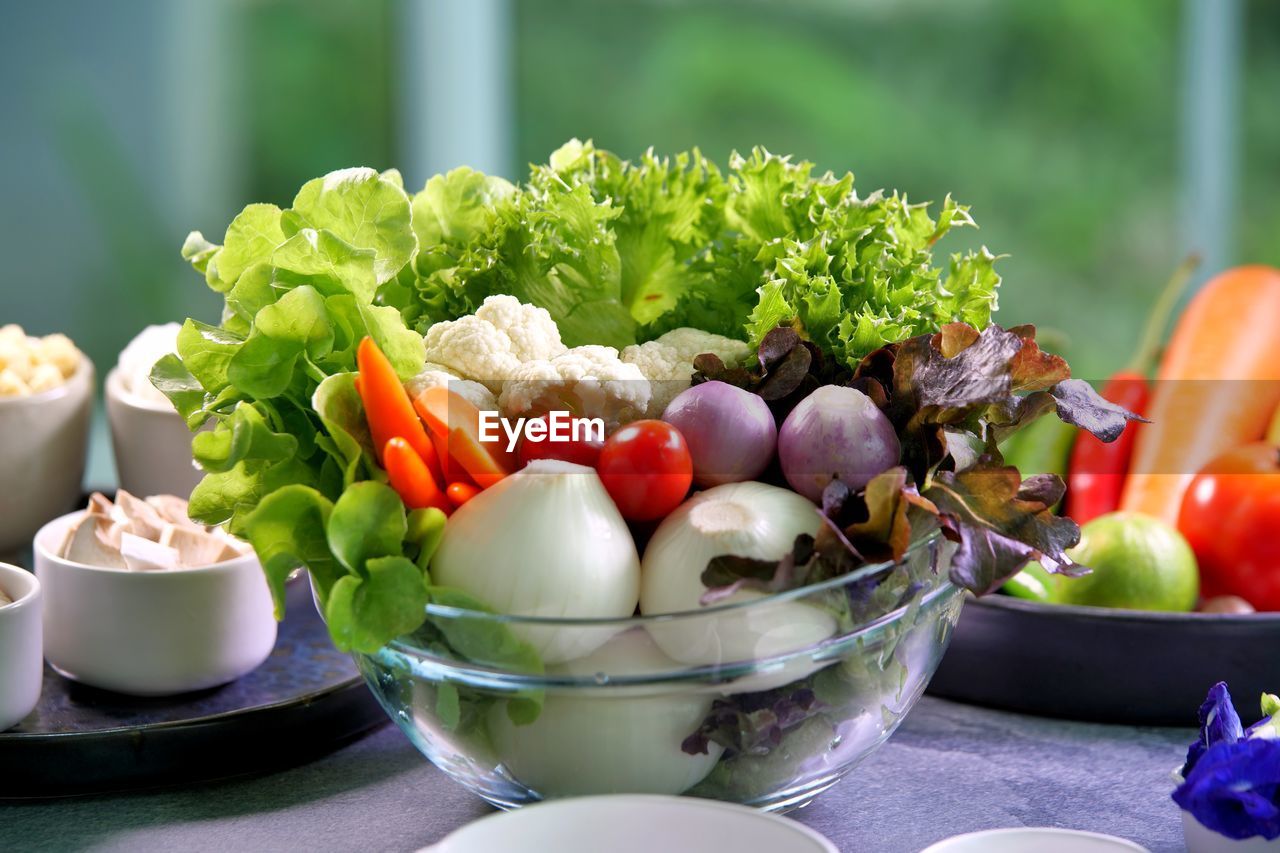 Close-up of fruits in bowl on table