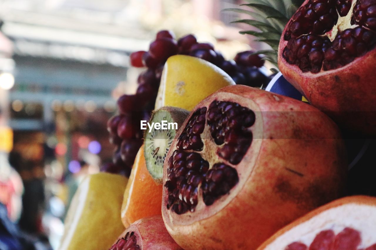 CLOSE-UP OF FRUITS IN MARKET FOR SALE