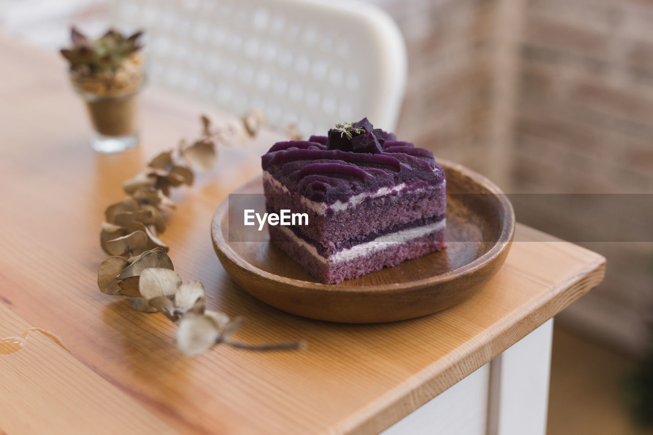 Close-up of cake served in bowl on table