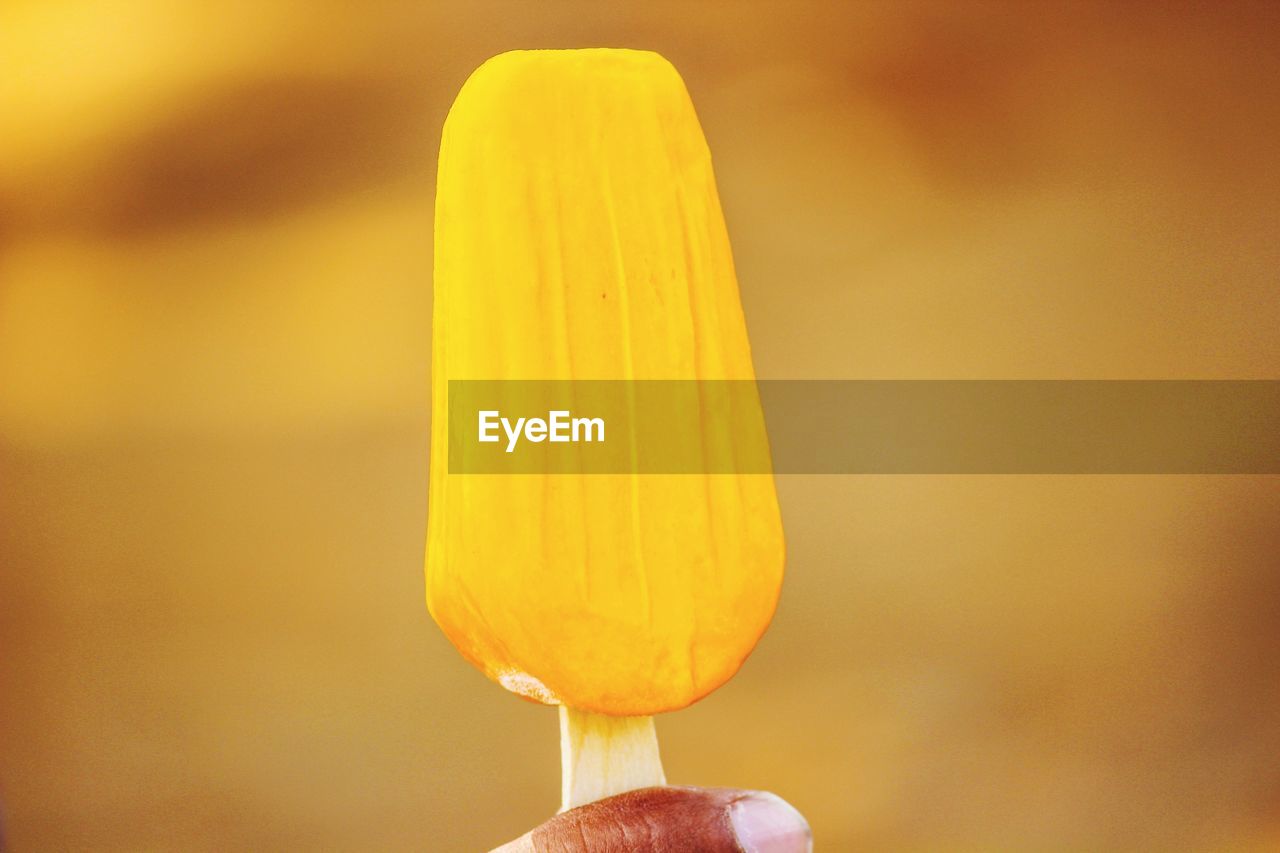 Close-up of yellow icecream 