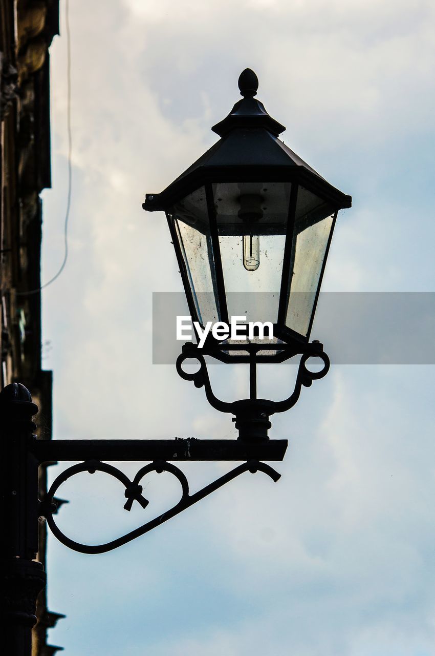 LOW ANGLE VIEW OF STREET LIGHTS AGAINST SKY