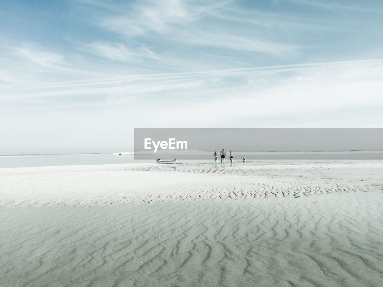 SCENIC VIEW OF SANDY BEACH AGAINST SKY