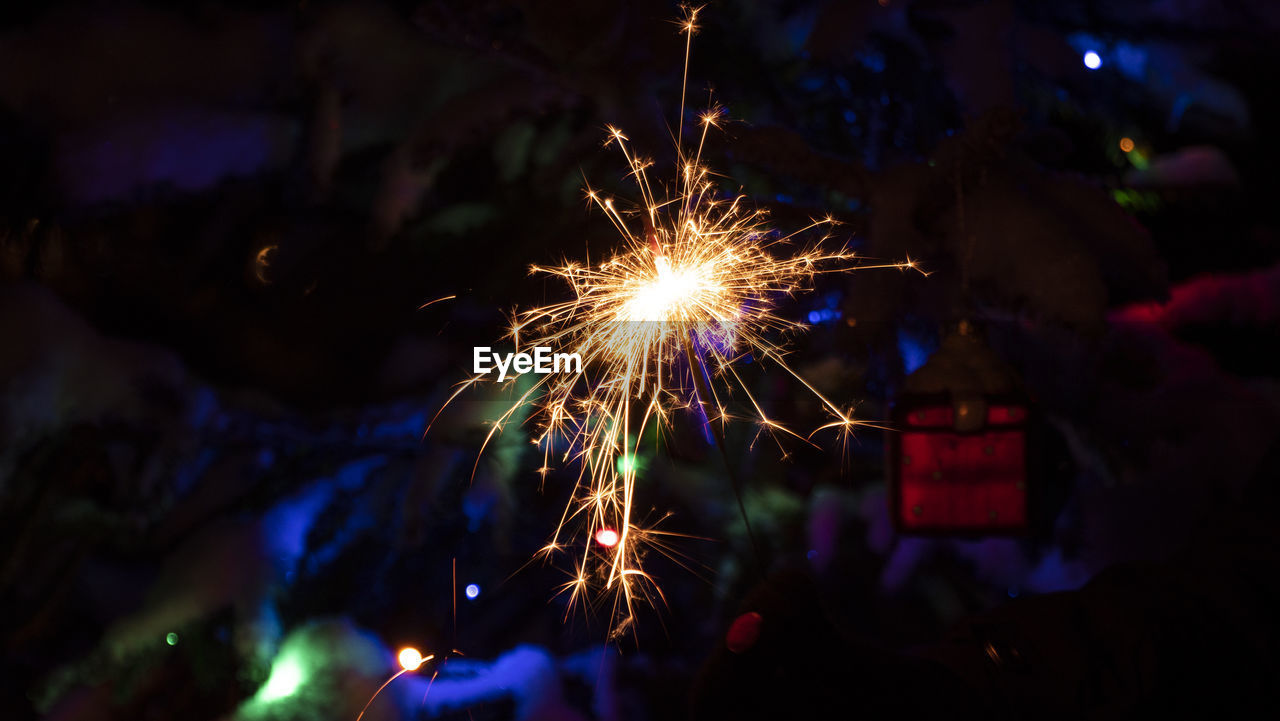 Firework display at night