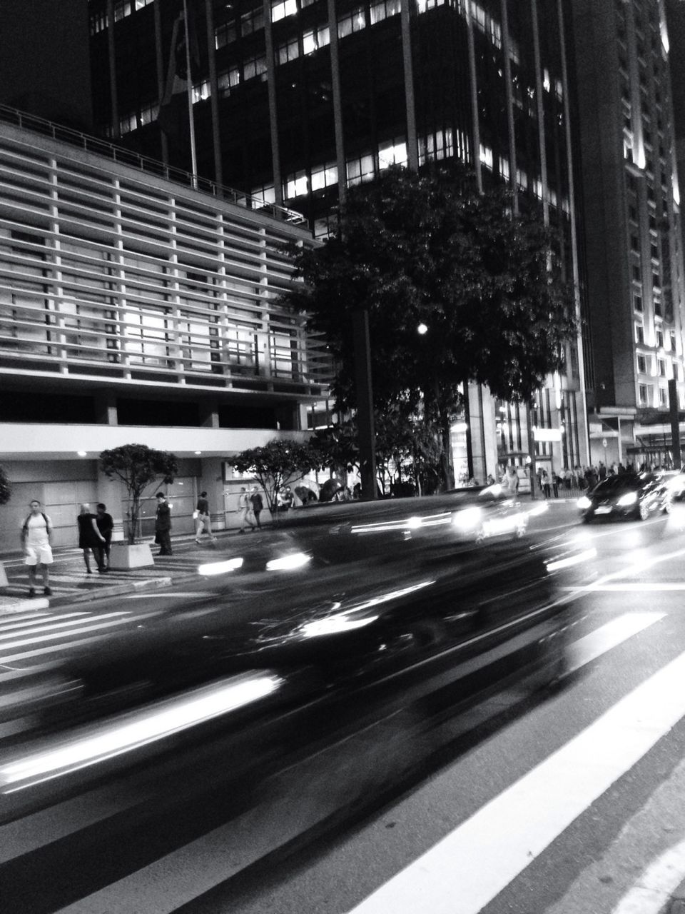 Blurred motion of car on road in city