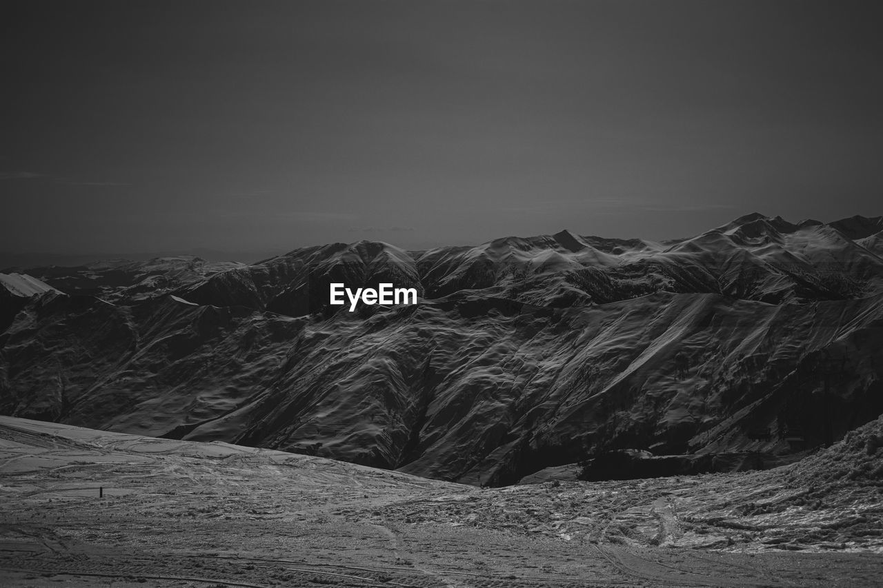 Scenic view of mountains against clear sky