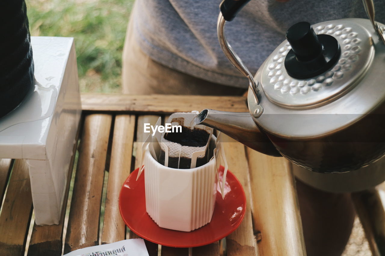 High angle view of coffee cup on table