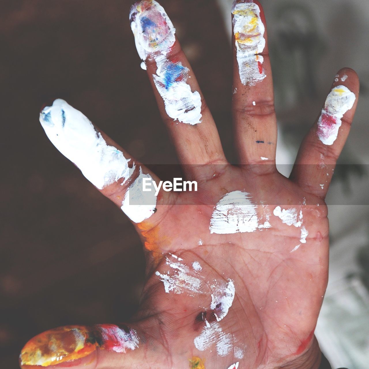 Cropped image of messy hand