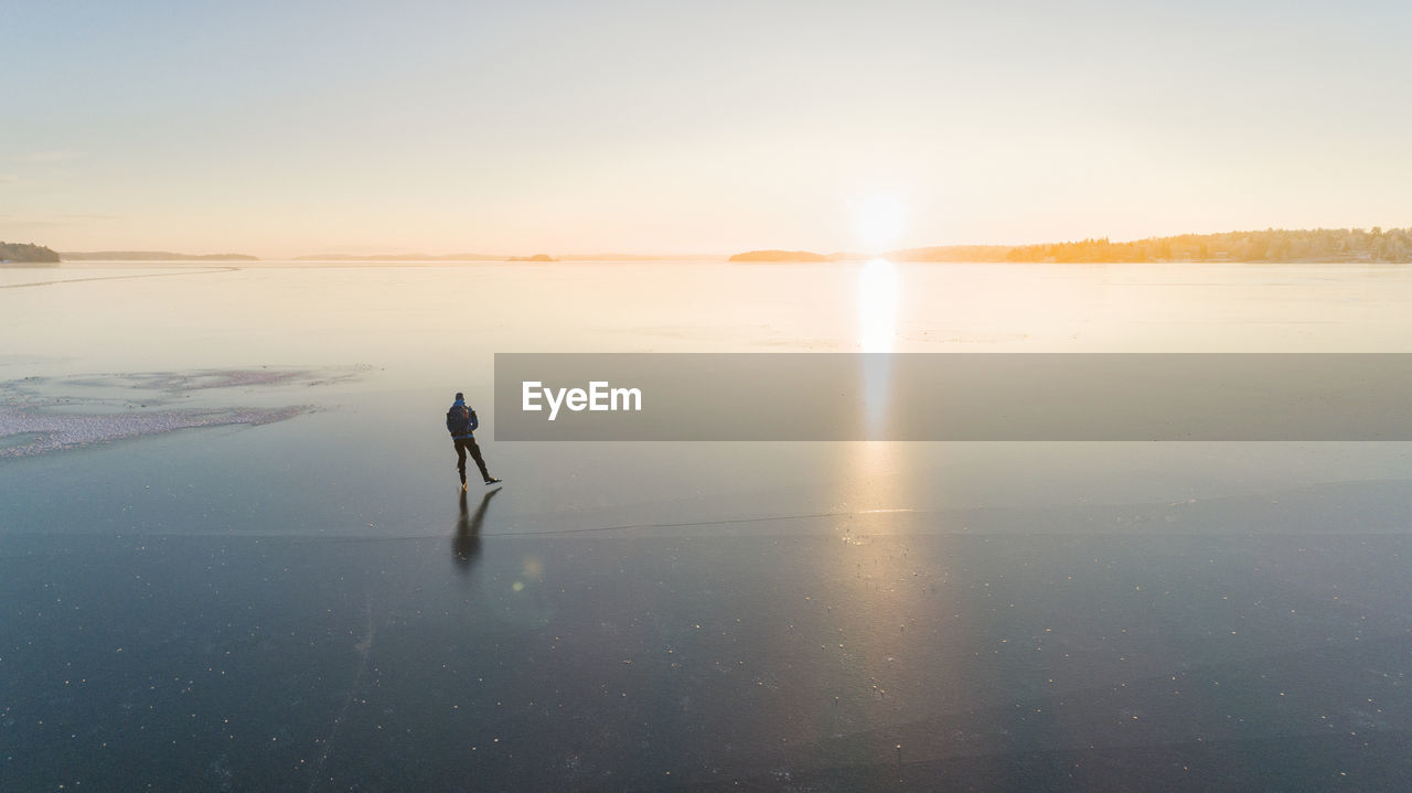 Ice skater on frozen sea