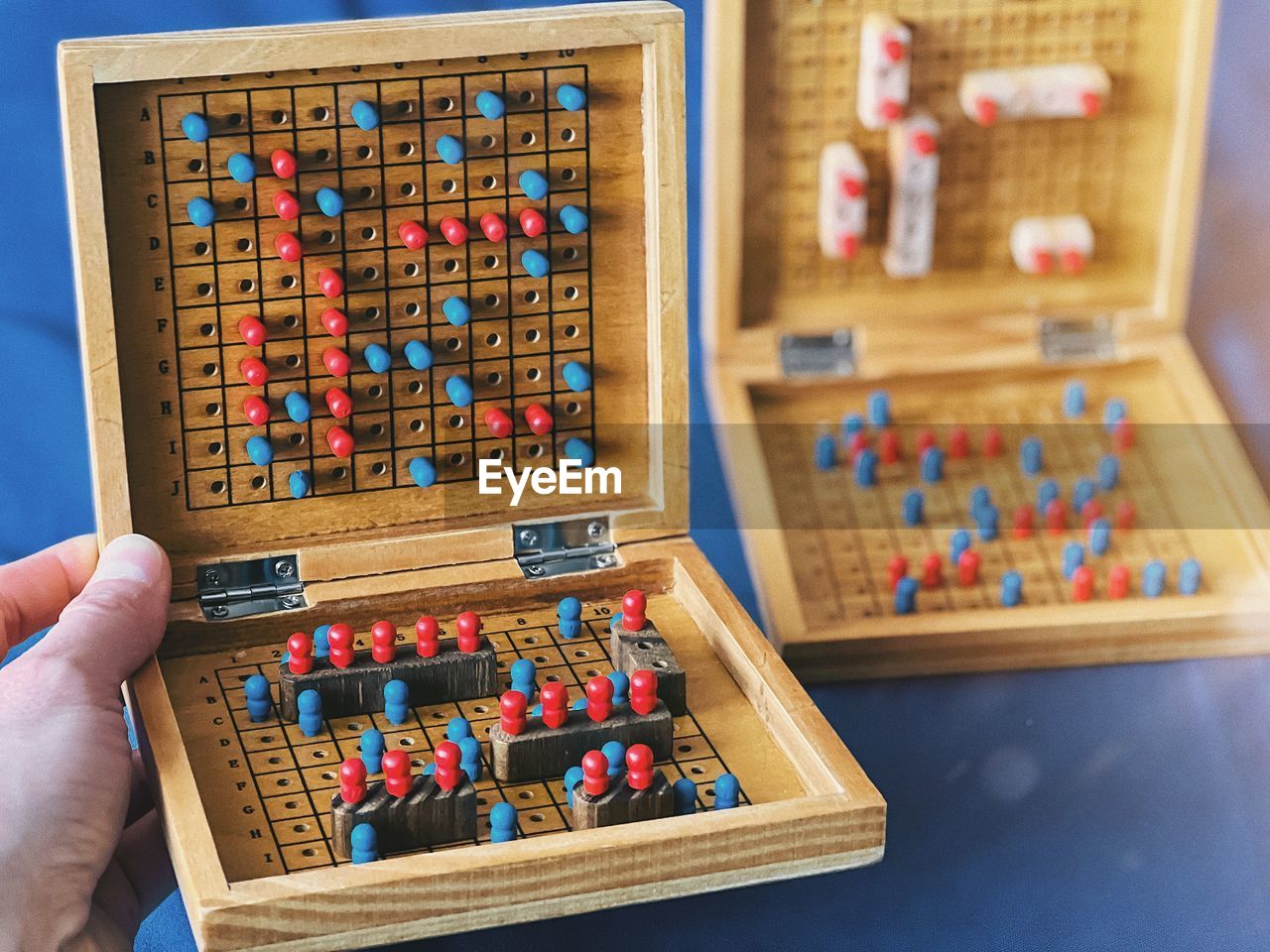 Close-up of a wooden sea battle classic board box game