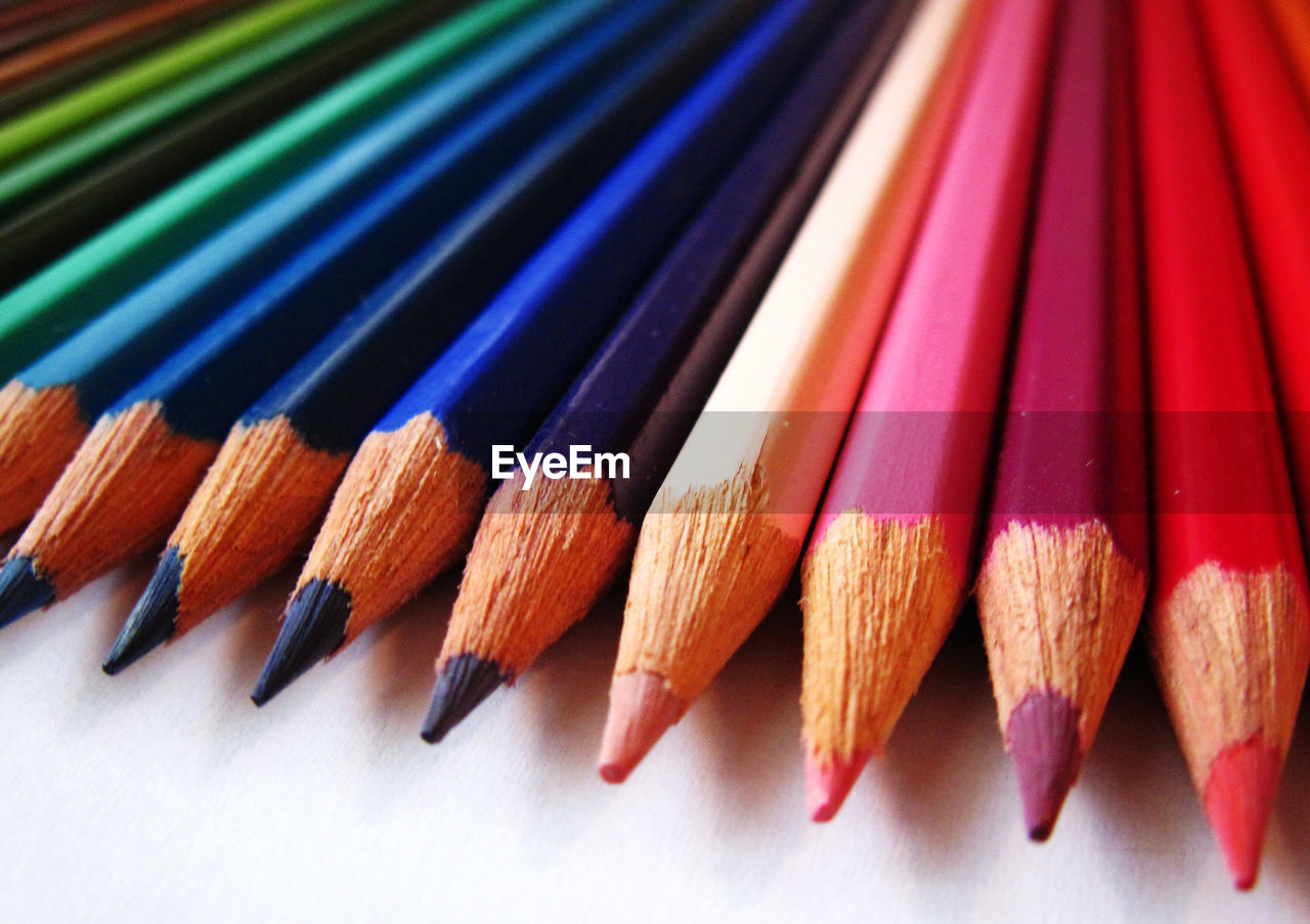 Close-up of colored pencils on table