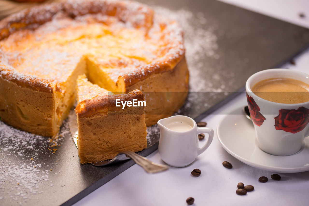 High angle view of cake and coffee on table