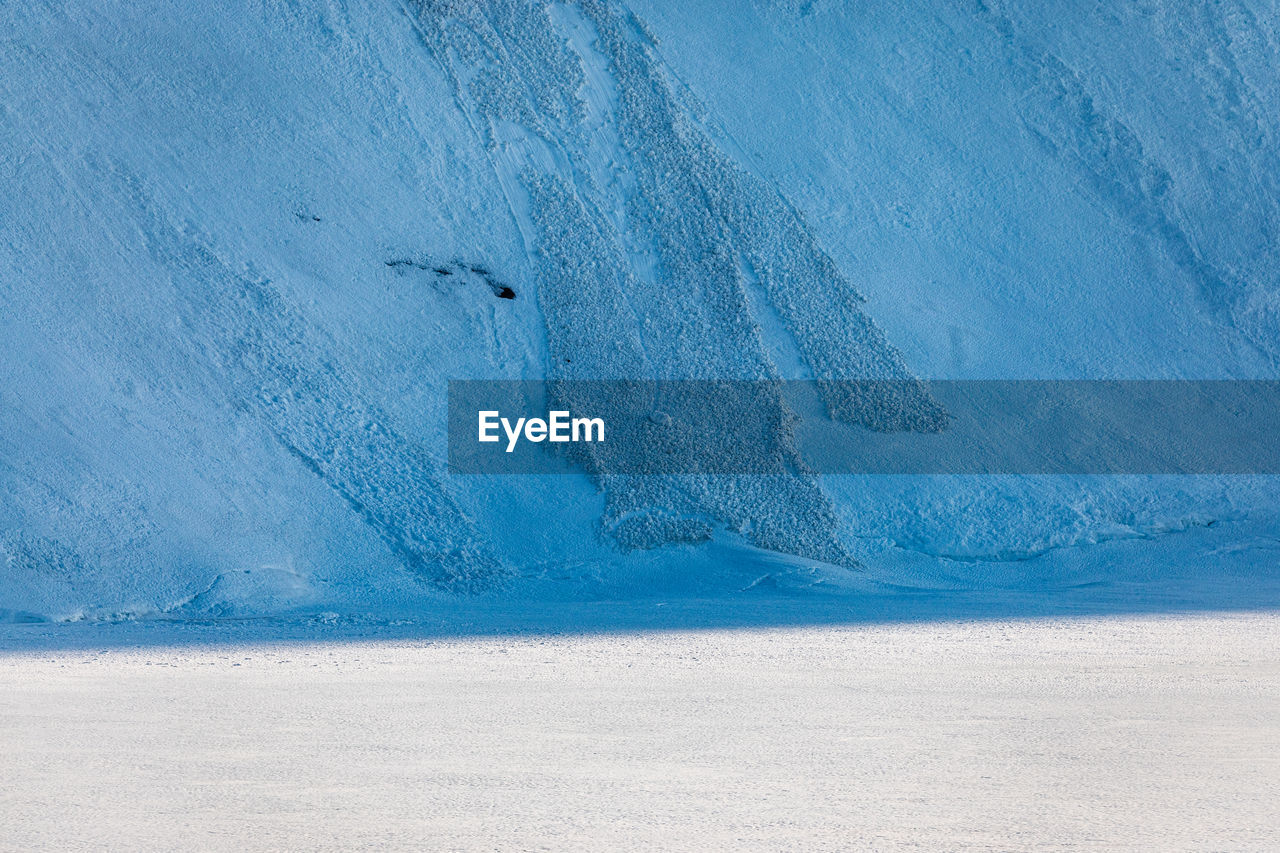 Scenic view of snow covered land