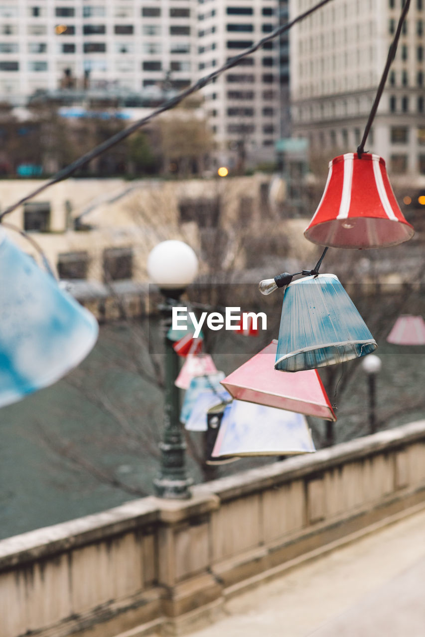 CLOTHES HANGING ON STREET BY BUILDINGS