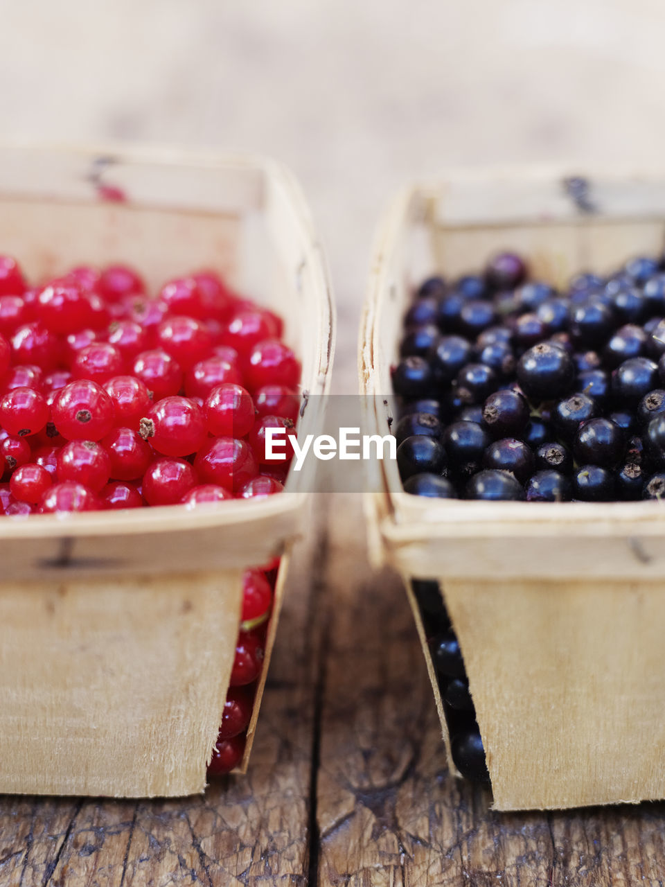 Redcurrants and blackcurrants in baskets