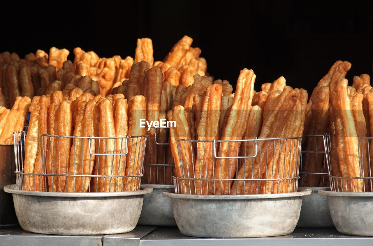 Fried food for sale at market stall