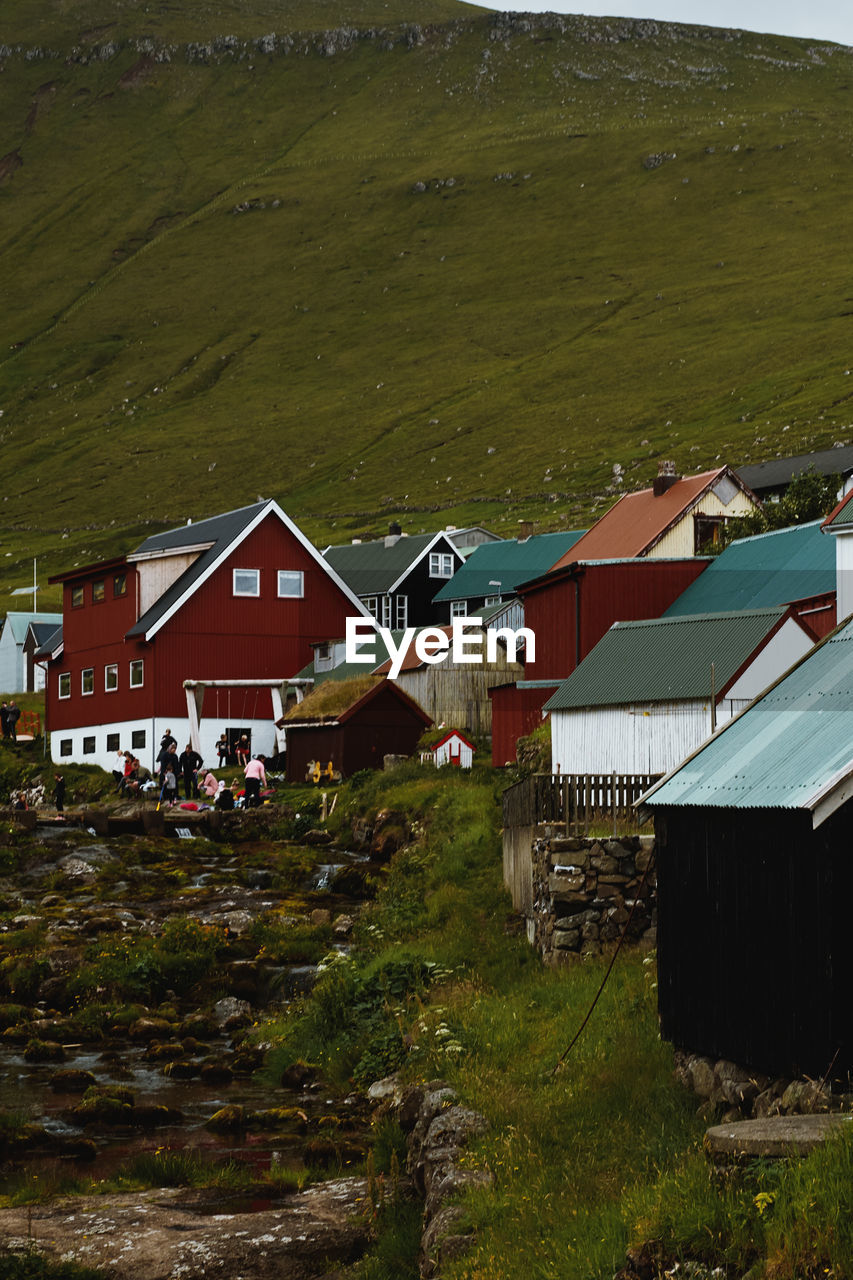 High angle view of houses by buildings