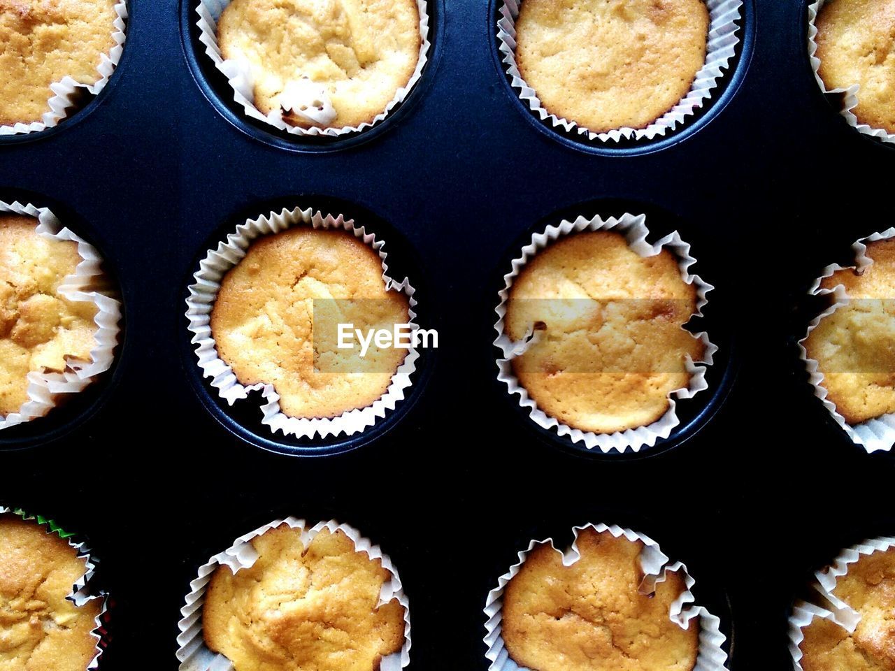 Full frame shot of apple muffins on table