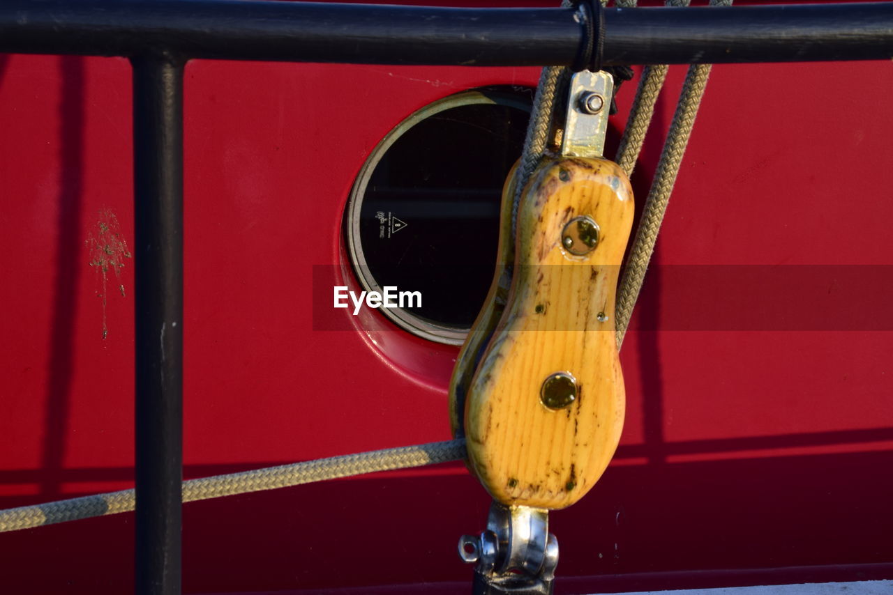 FULL FRAME SHOT OF YELLOW METAL CONTAINER