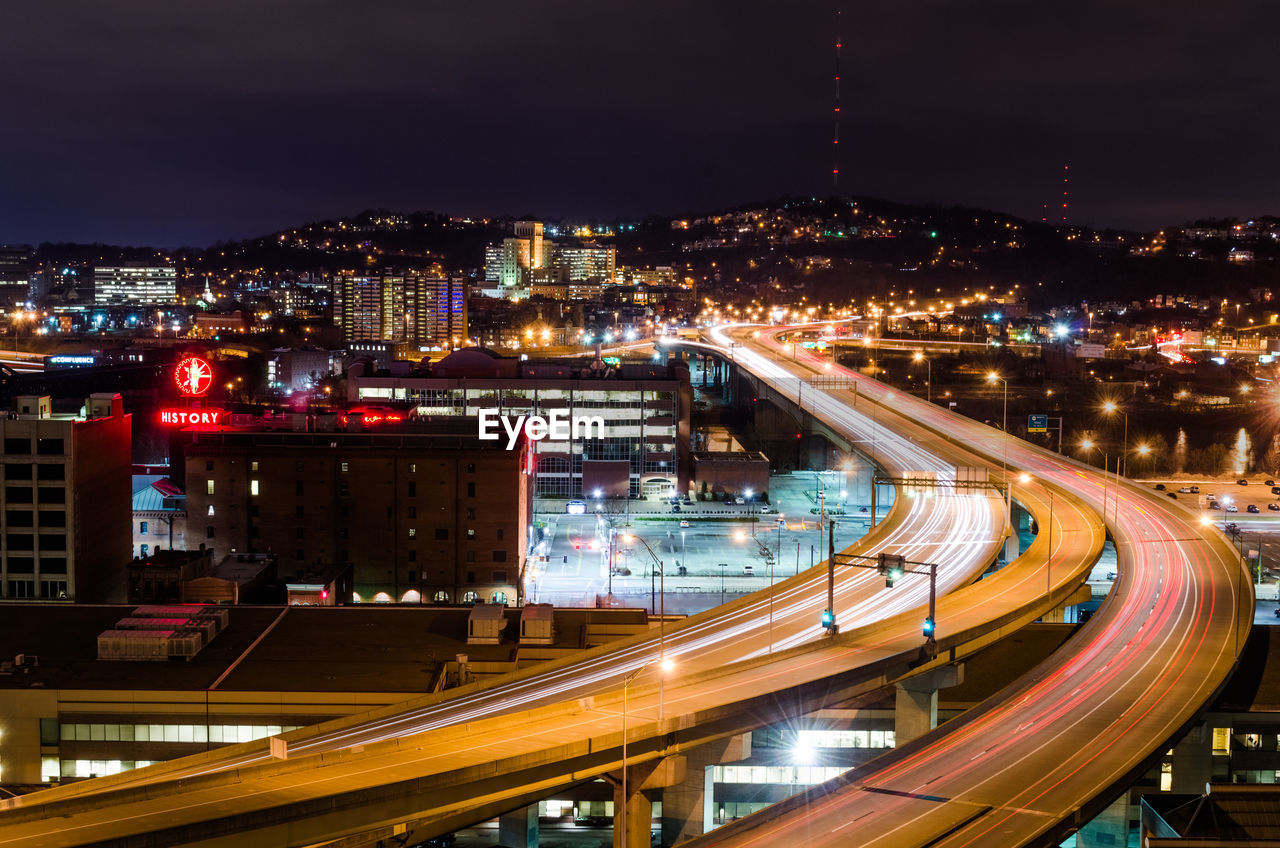 Light trails on city street at night