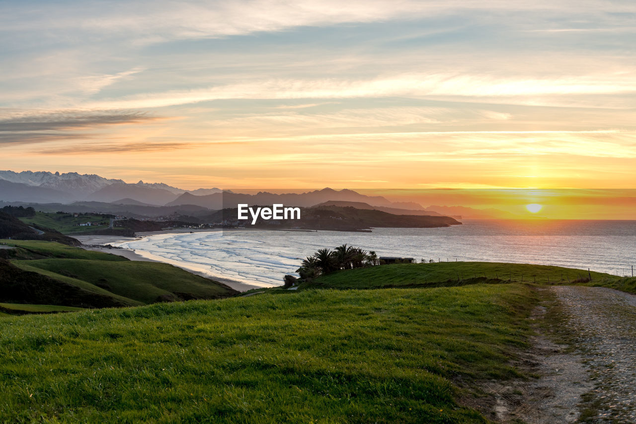 Scenic view of sea against sky during sunset