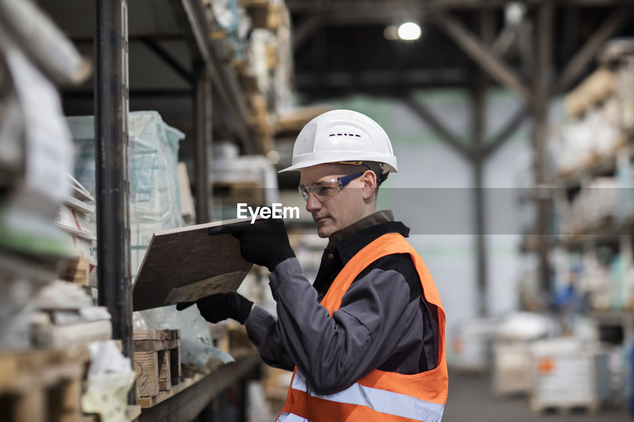 Warehouse worker male working in a store