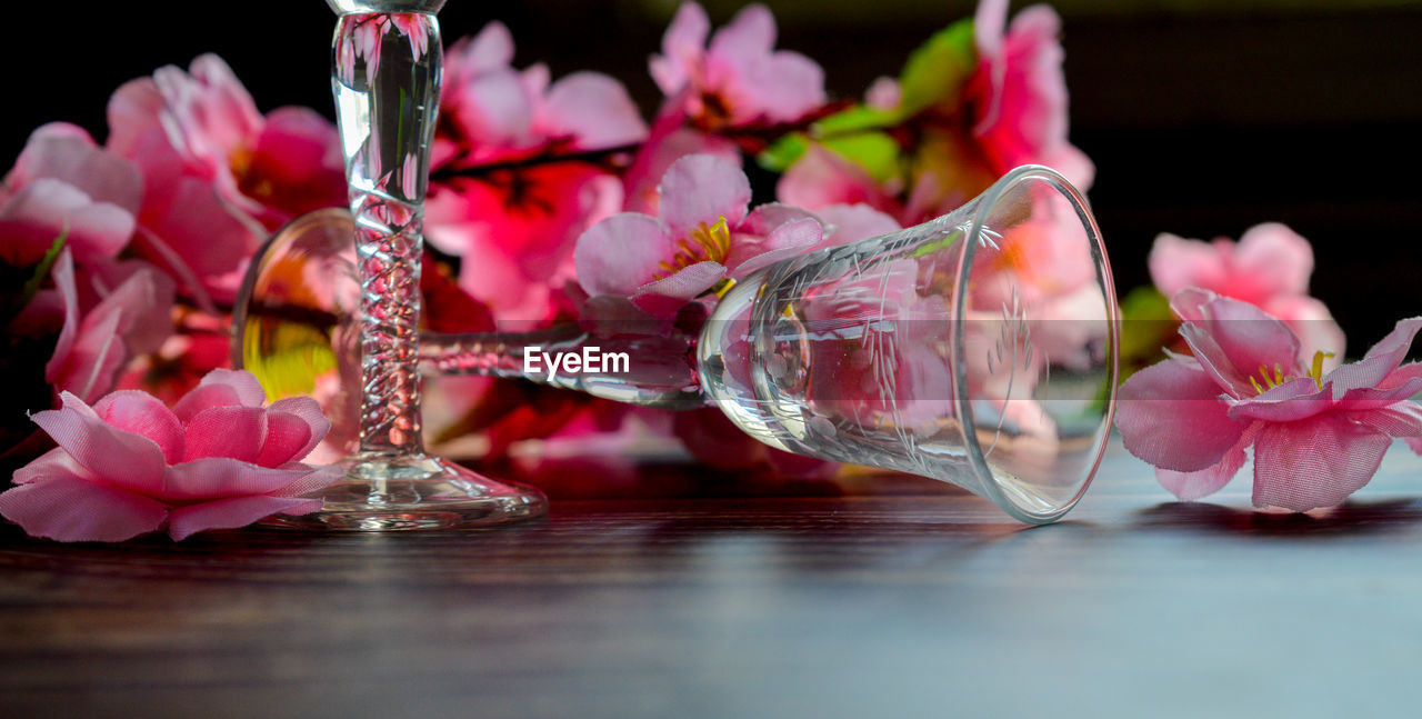 Glass and pink flowers