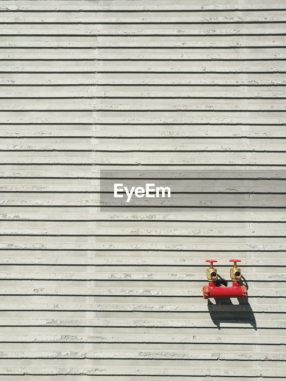 Fire hydrants mounted on wall