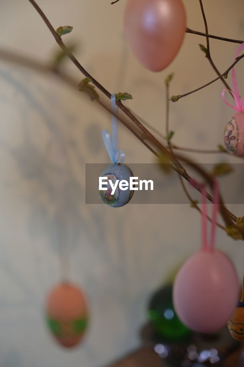 tree, plant, decoration, celebration, no people, flower, close-up, focus on foreground, nature, selective focus, holiday, tradition, macro photography, branch, easter, easter egg, fragility, multi colored, egg, pink, outdoors, day, event, toy, twig, balloon, leaf