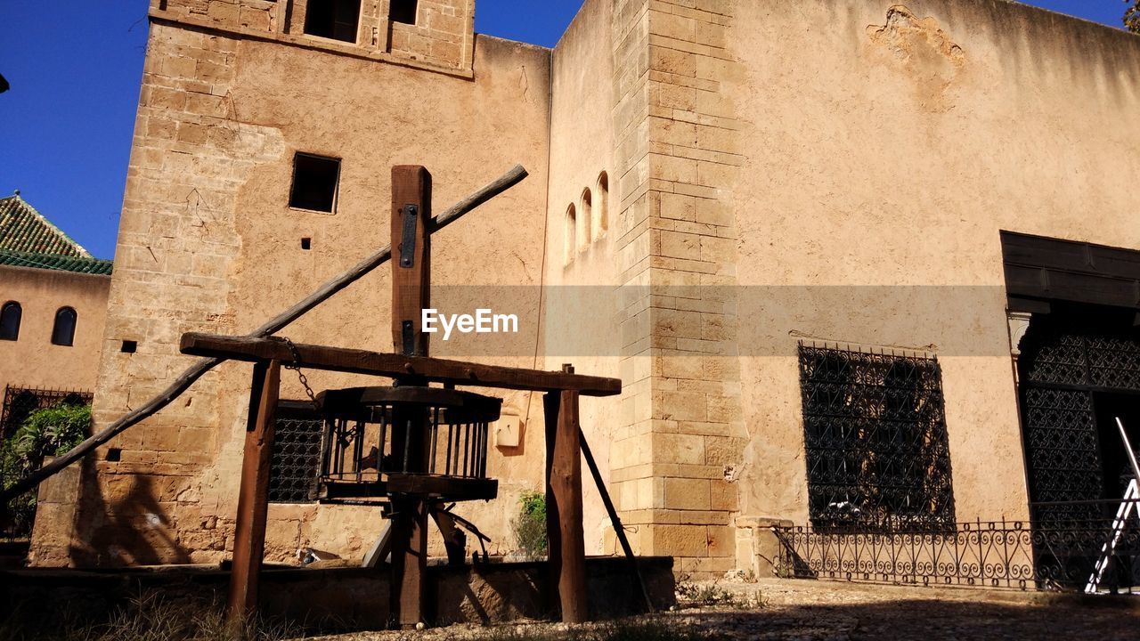 LOW ANGLE VIEW OF OLD BUILDINGS IN TOWN