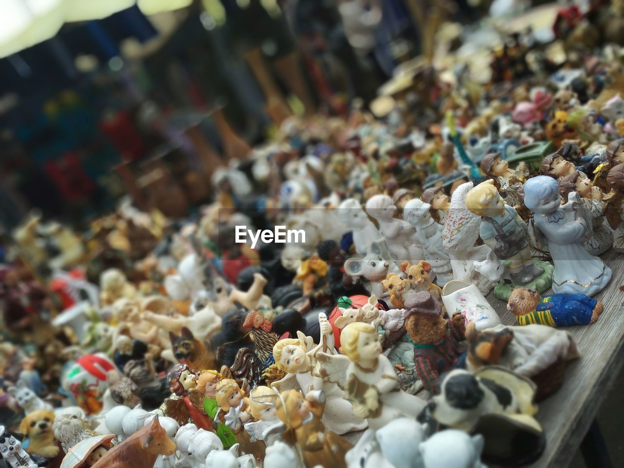 High angle view of multi colored figurines at market for sale