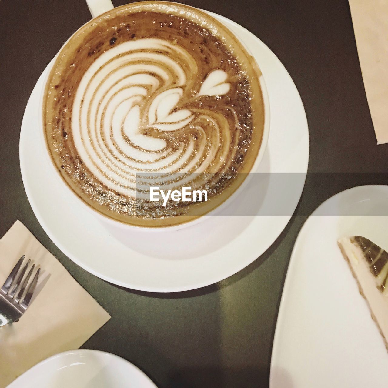 High angle view of coffee served on table