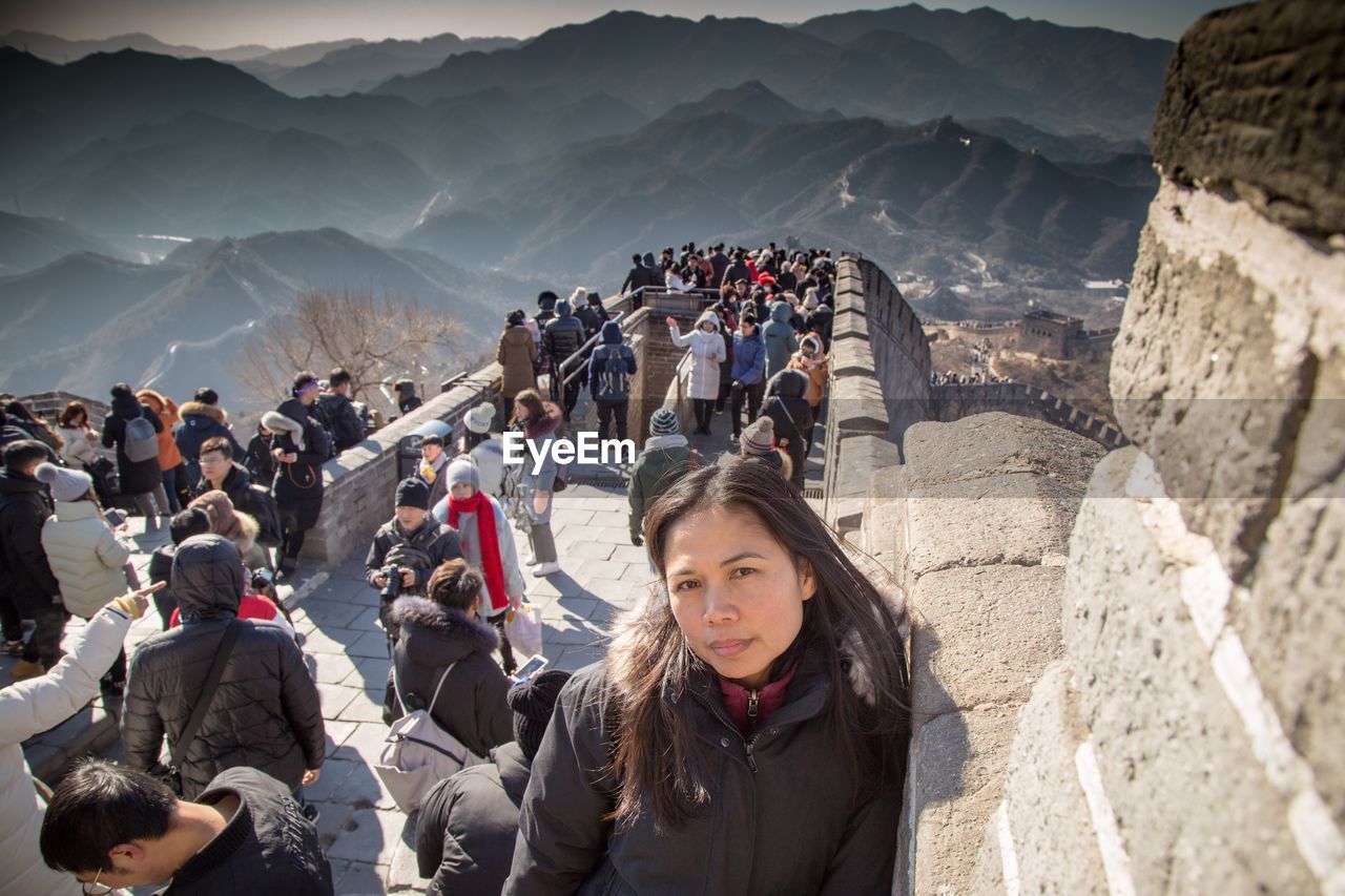 Woman standing on great wall of china