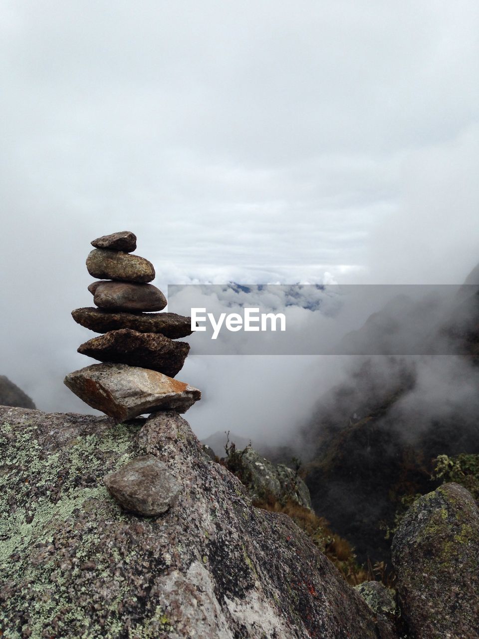 Stack of rocks against sky