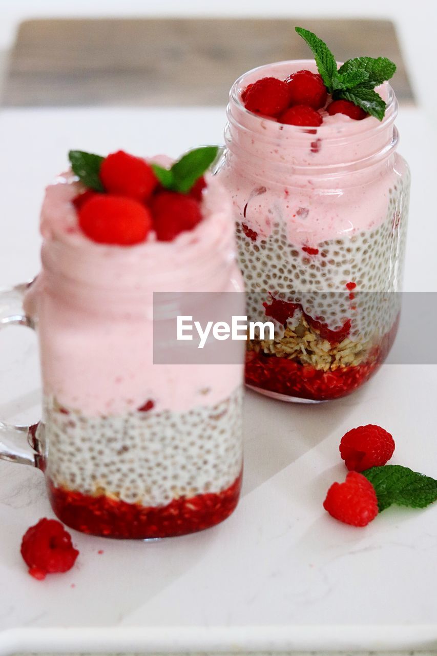 CLOSE-UP OF STRAWBERRY CAKE WITH ICE CREAM