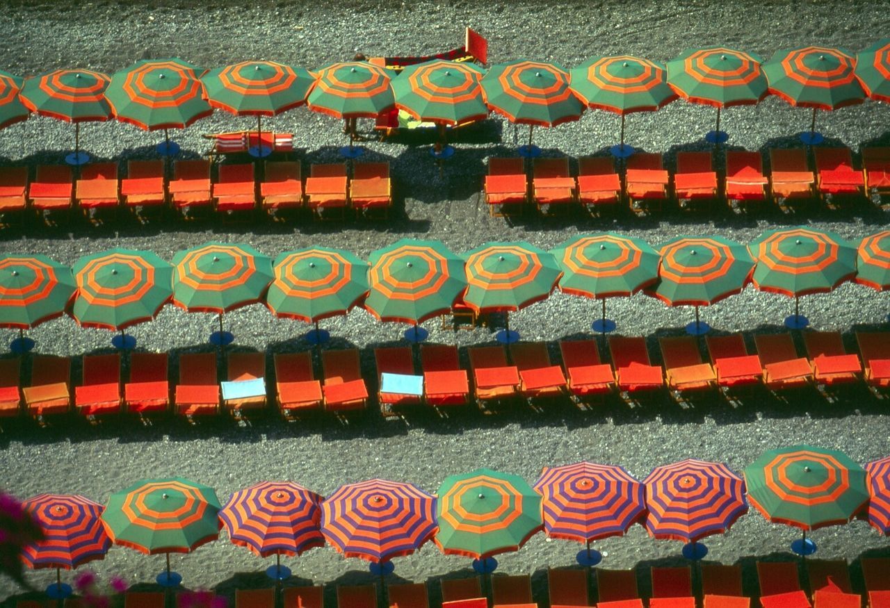 High angle view of umbrellas and lounge chairs at beach