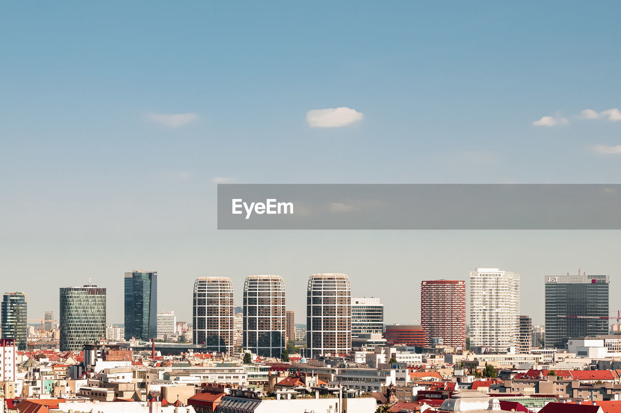 MODERN BUILDINGS AGAINST SKY