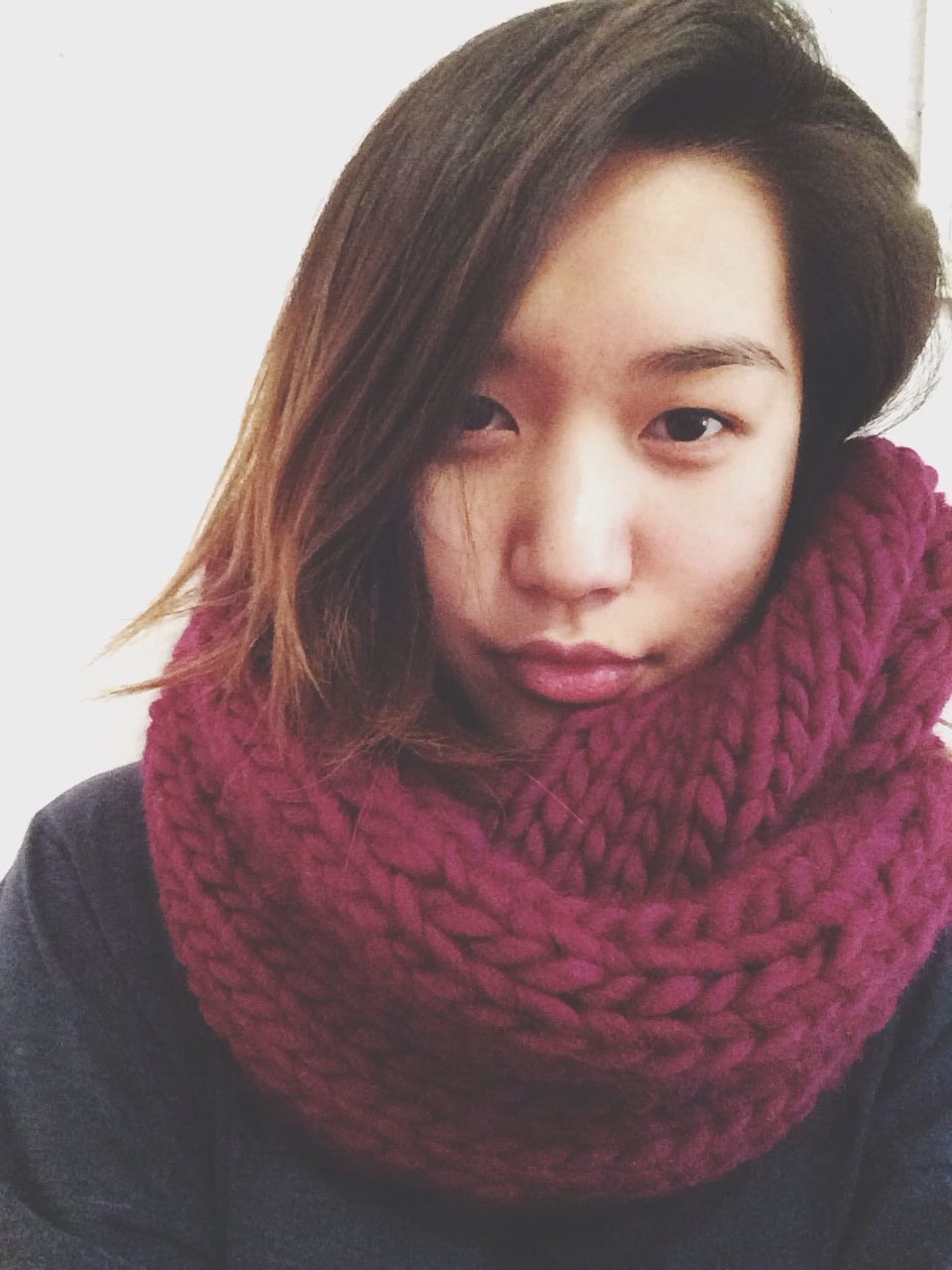 Portrait of a teenage girl in wool shawl
