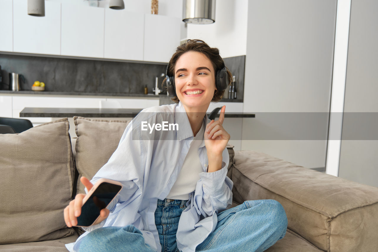 young woman using mobile phone